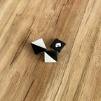 Bouton à tige triangle blanc/noir